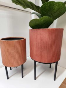 Earth-tone pottery planter stands