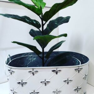 A beautiful tin planter in white & blue flora-lea pattern